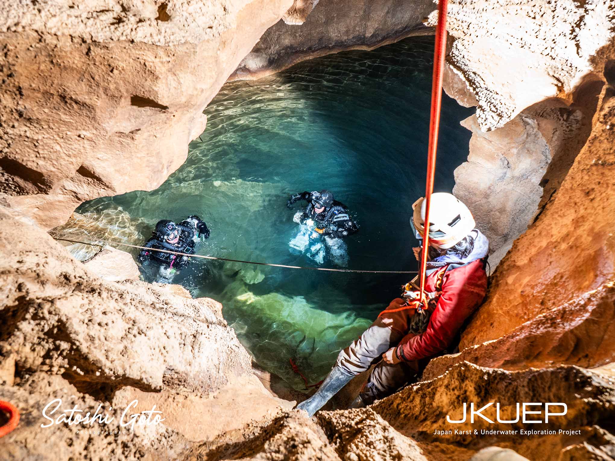 A scene of divers beginning their descent into the Terayama Cave on Akiyoshidai