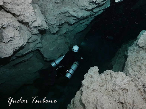 Sidemount diver swimming across White Hall